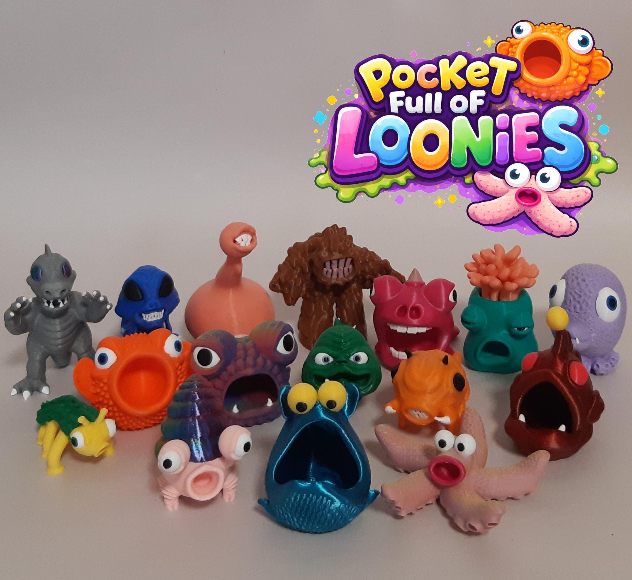 Collection of colorful toy figures with 'Pocket Full of Loonies' logo above them.